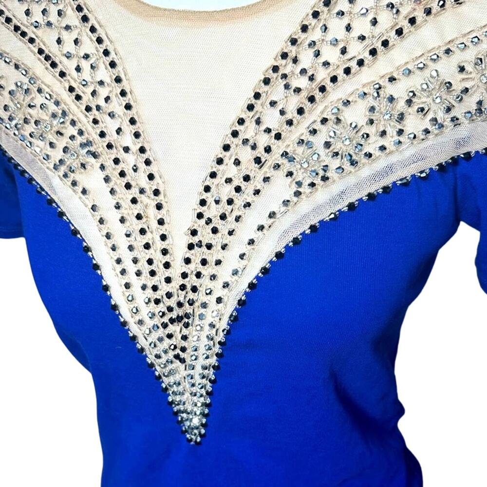 Sexy fitted Mesh and bead shirt.